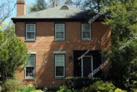 06045520230918-stock-photo-two-story-square-brick-house-30821671 Two Story Square Brick House Stock Photo 30821671 Shutterstock