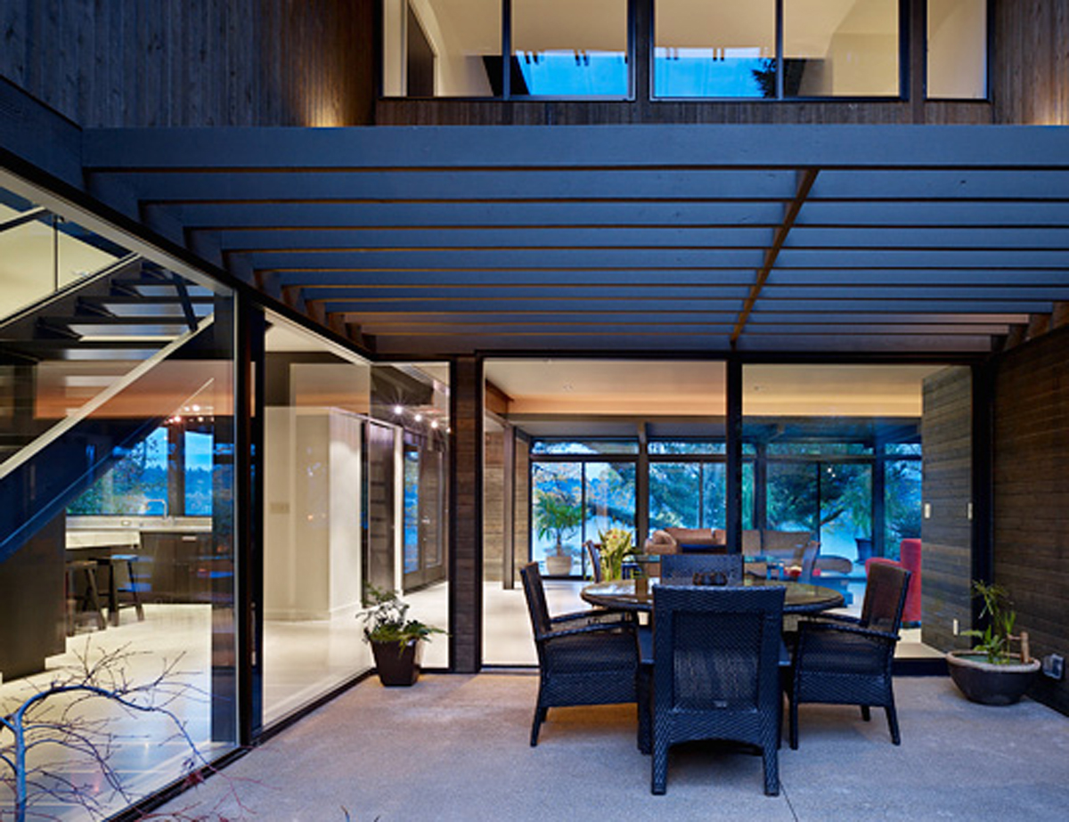 Two Storey Glass House Architecture in Modern Design for Family Living