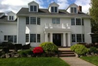 White Two Story Colonial Home With Classic Square Pillars Colonial