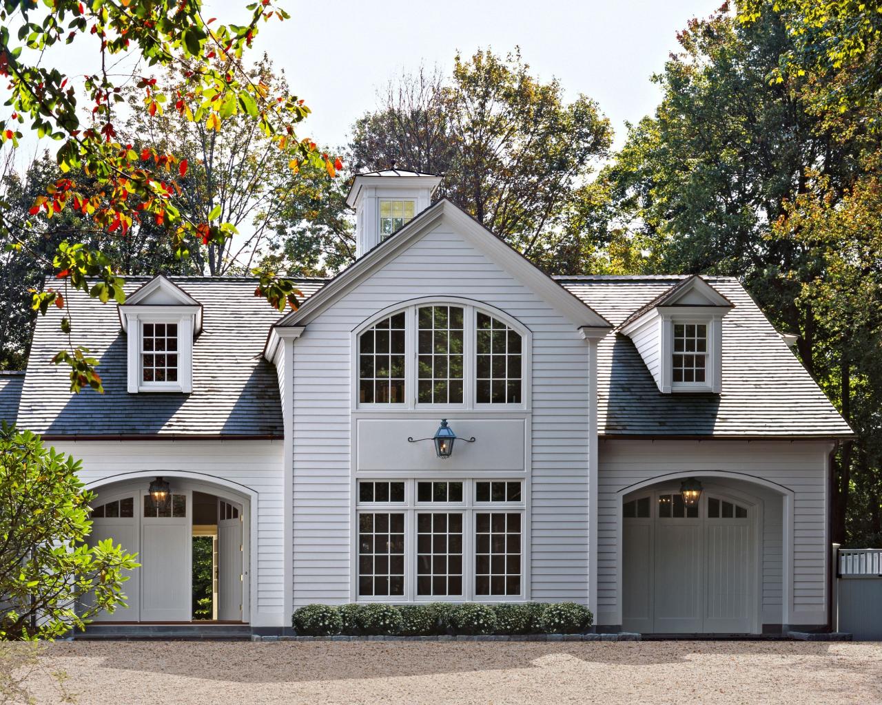 Neoclassical Pool House The front facade is designed to emulate a
