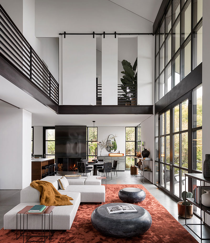 Doubleheight ceiling and unusual furniture modern bay house in