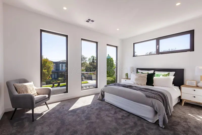 Modern Bedroom Interior in Two Storey Townhouse. Stock Photo Image of