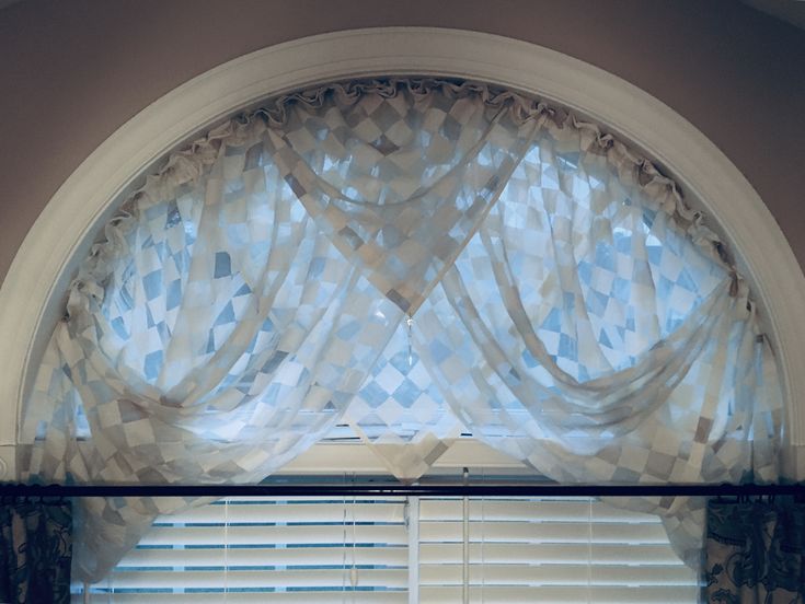 It’s not easy making a shade for a half moon/arched window. I finally