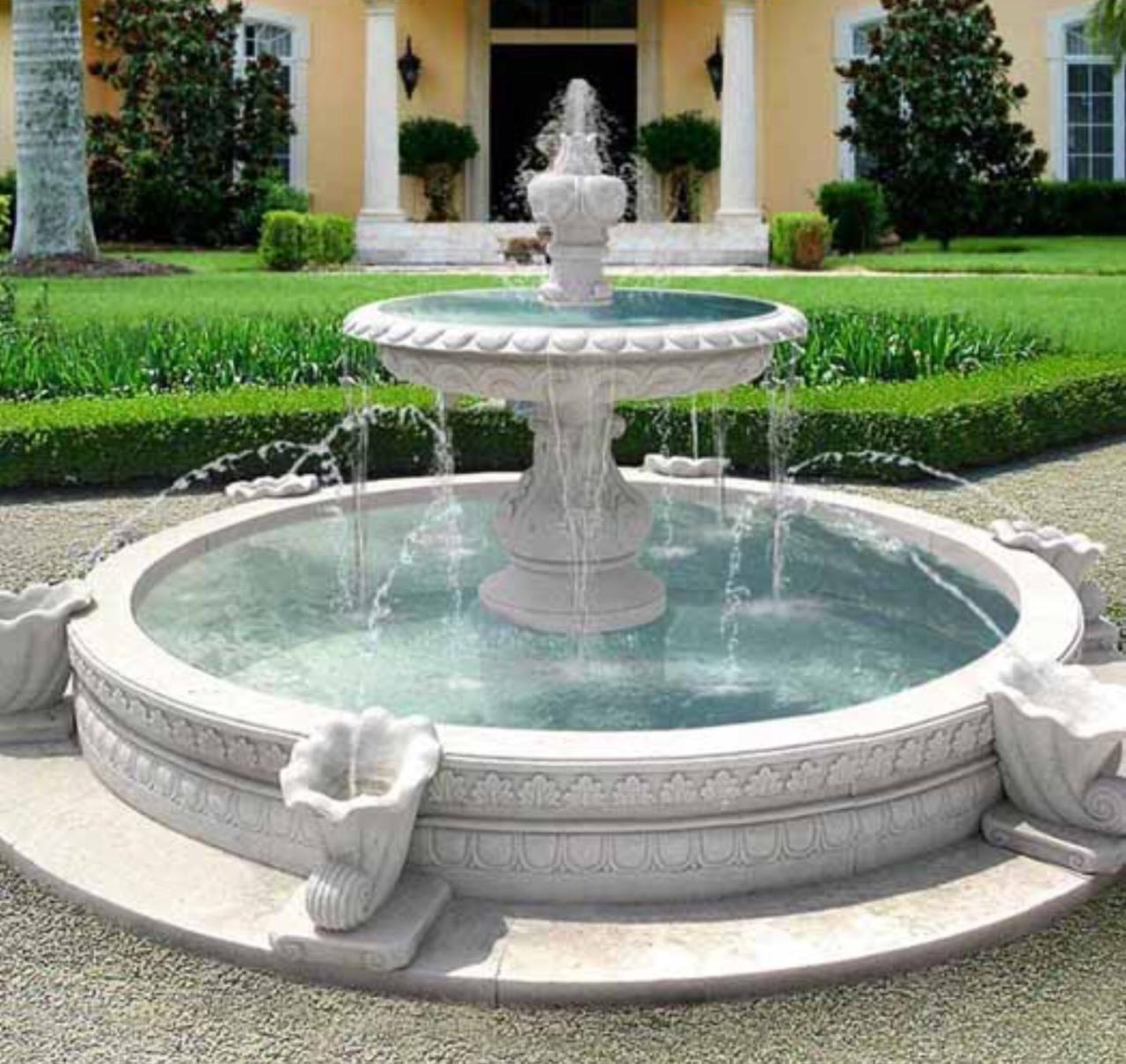 Circle fountain in driveway. Water fountains outdoor, Garden water