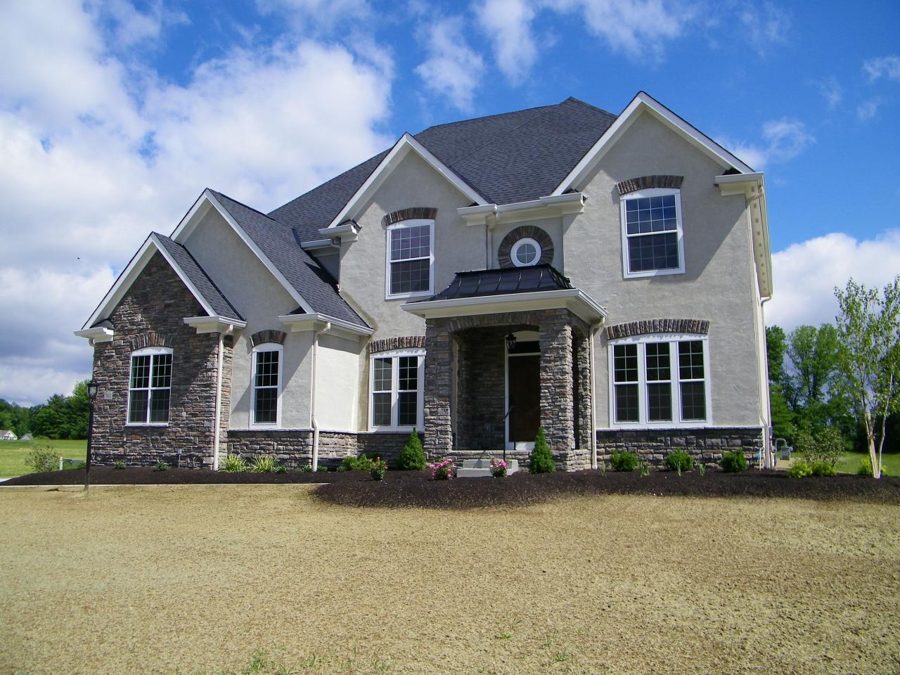 This is an impressive example of a custom built 2 Story Home by