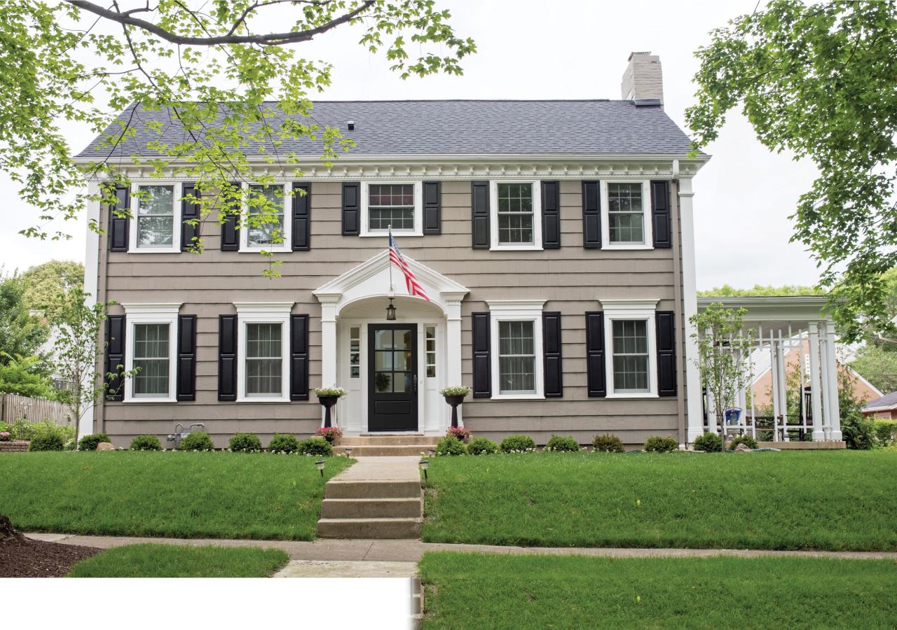 2 story colonial home featuring wood siding, decorative urethane